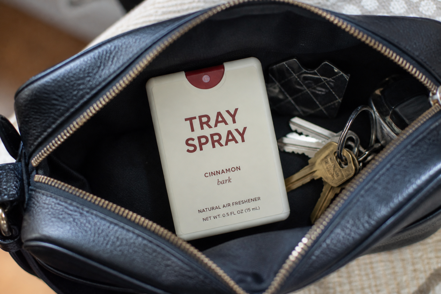 Tray Spray in a purse with keys